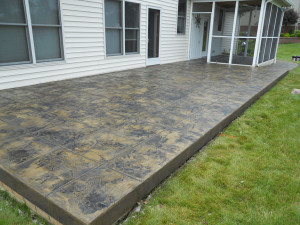 This is the after photo of the stamped overlay. Two different colors of stain where applied as well to achieve this look.